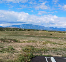 An overlook looking at the mountains in the distance on a bright sunny day near Happy Acres RV Park in Pueblo, Colorado.